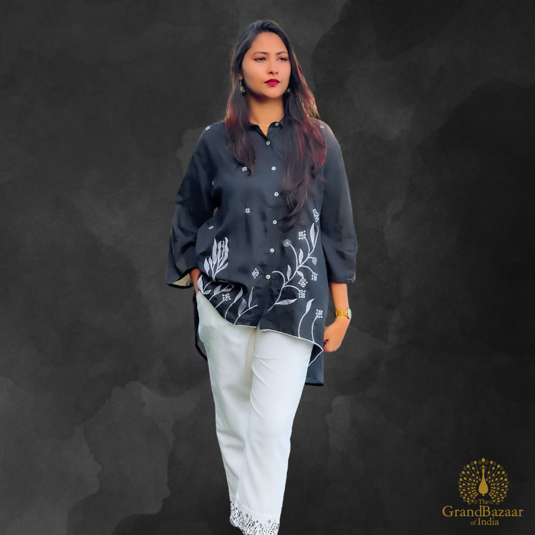 Black kurti and white pants and floral embroidery